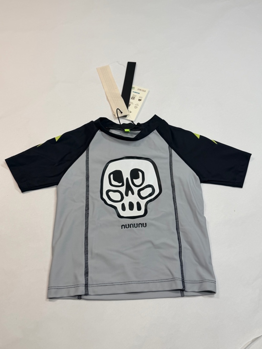 Nununu Silou skull rashguard in Lunar Grey